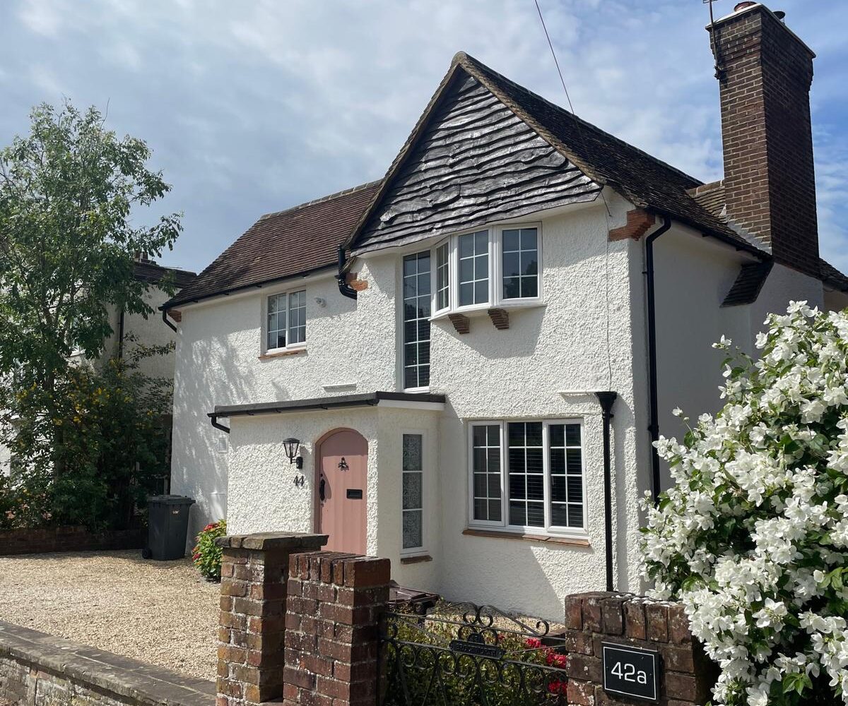 painting exterior brick walls in white pebble dash